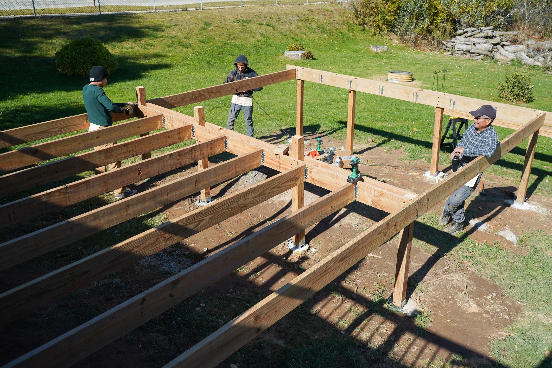 Construction crew working on framing for a building project